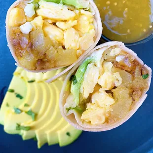 Egg, cheese, potatoes, rajas, corn breakfast burrito.