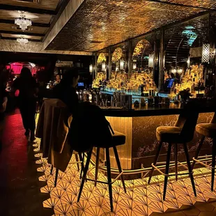 Sit at the bar for a nice view of the cocktail crafting
