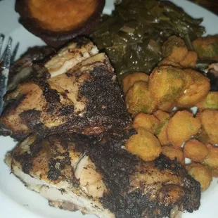 a plate of meat and vegetables