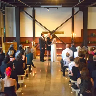 A fall wedding ceremony at MadArt Studio.