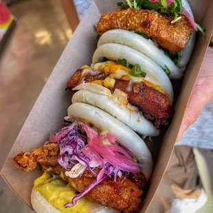 Trio of sliders on bao bun (Crispy Pork Belly, Spicy Pork Belly and Thai Sweet Chilli)
