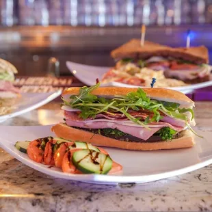 The Big Pa- mortadella, capicola, salami, provolone, sautéed broccoli rabbe, pepperoncini, roasted tomato, fried eggplant slab