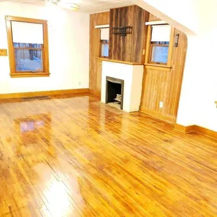 a living room with hardwood floors