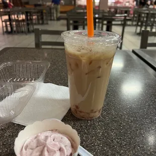 Chocolate cupcake with berries cream and rose milk tea with Crystal boba.