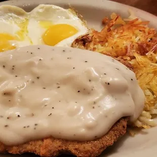 fried chicken with gravy and hash browns