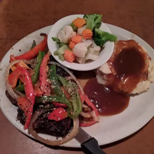 Pepper steak: amazing! So perfectly seasoned! You get a salad and bread too!