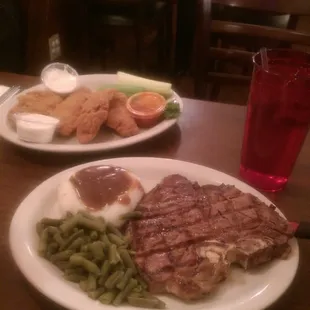 T-bone and chicken fingers, this whole meal cost 14.02