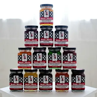 a stack of jars of jams