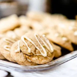 a plate of cookies with icing