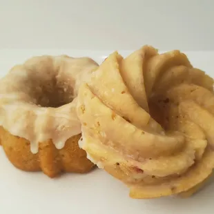two glazed donuts on a plate