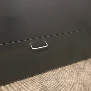 a close up of a black filing cabinet