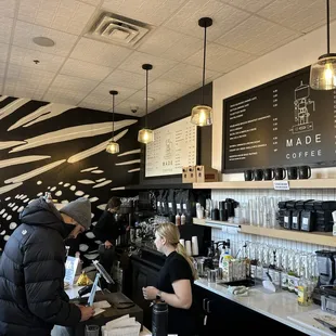a man and a woman at the counter