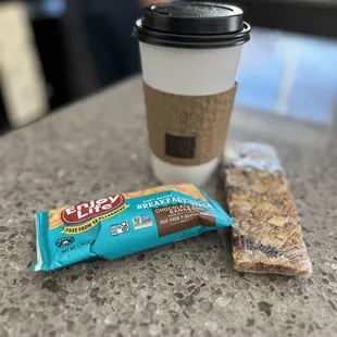 a cup of coffee and a snack bar