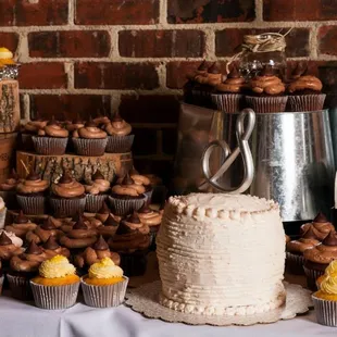 A Cupcake and Cake station at a beautiful Everal Barn wedding.