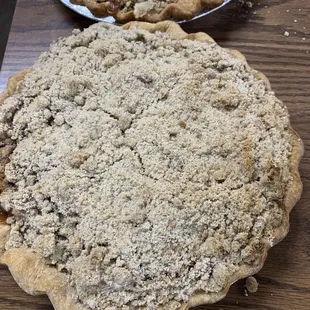 two pies on a wooden table