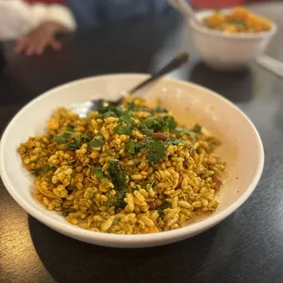 bhelpuri - it's served cold. cold mixture of puffed rice tamarind sauce mixture and nuts (indian trail mix?) though it tasted good.