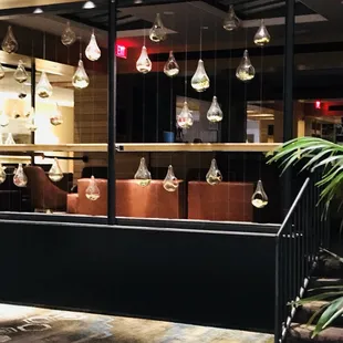 a display of glass vases in a store window