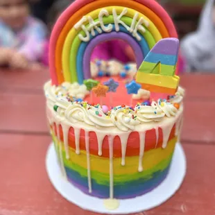 a rainbow cake with icing