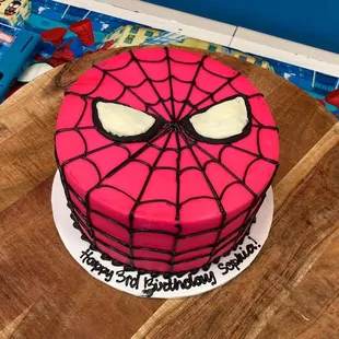 Custom Spiderman themed 8" cake with death by chocolate flavor a layers of buttercream.