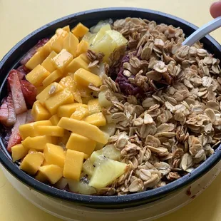 The Hawaiian acai bowl w/o coconut and add kiwi! This place has the best acai bowls :)
