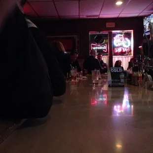 people sitting at a bar