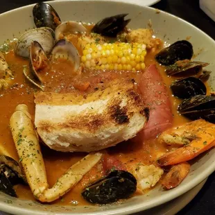 Cioppino! Do not skip. Plan on getting messy!
