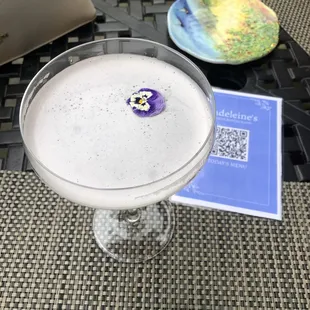 Lemon drop martini with a flower