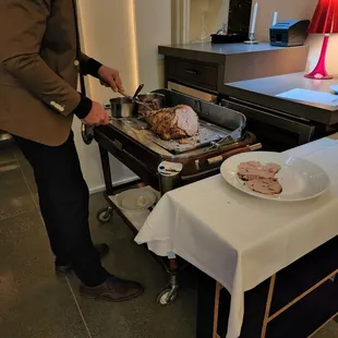 Cutting the roast beef