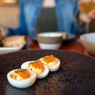 Smoked Deviled Eggs $18 "horseradish, creme fraiche, trout roe"
