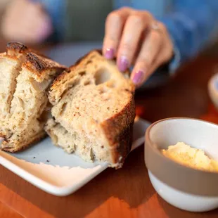 Midwife &amp; the Baker Grilled Sourdough $8 "citrus butter"... (that's right, they charge you for table bread!!!)
