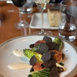 Seared scallops and black truffles