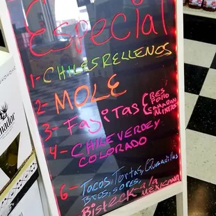 a sign in a liquor store