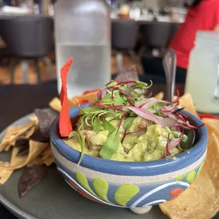 The guacamole was delicious and the chips were nice and thick not greasy at all.