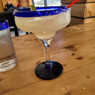 a margarita and a glass of water