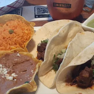 Barbacoa tacos (slow-cooked in spices, dry peppers and vinegar)