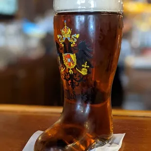 a glass of beer on a table