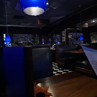 a restaurant with blue lights