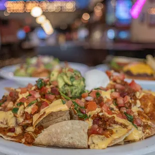 a plate of nachos on a table