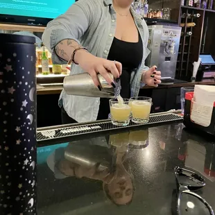 Hannah pouring us our celebratory shots!