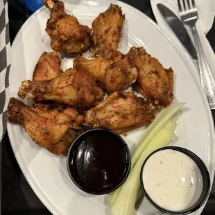 Wings Wild Buffalo Wings (8) with sriracha bourbon sauce on the side.