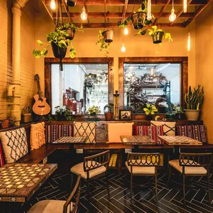 The dining room, with plenty of seating, and easily moveable chairs and tables.