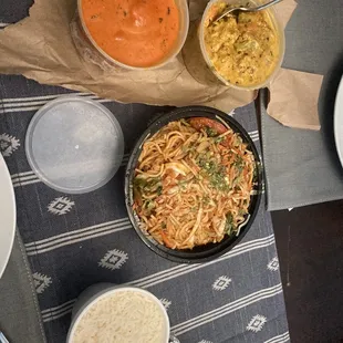 Vegetable Hakka Noodles, Vegetable Korma, and Chicken Tikka Masala
