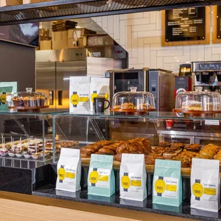 a display of coffee and pastries