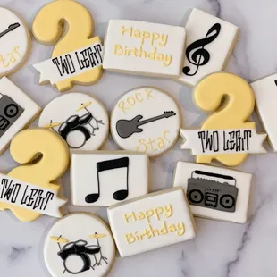 a pile of decorated cookies