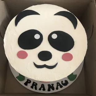 a panda cake in a box