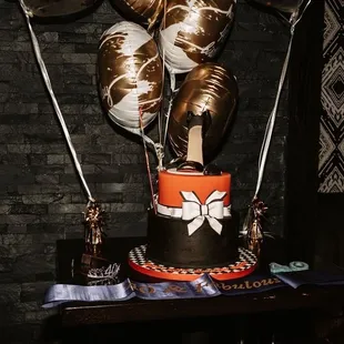 a giraffe on top of a cake