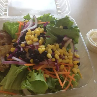 Salad and a little baked chicken. With small coffee, $5.75.