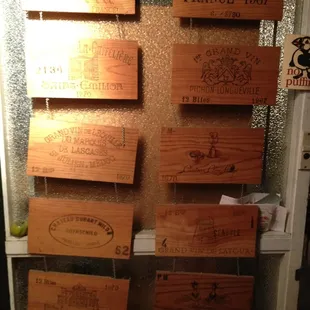 a wall of wine crates