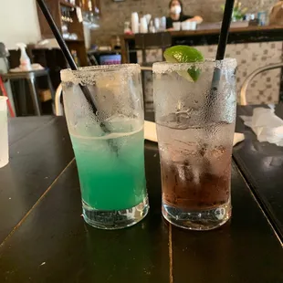 two cocktails on a table