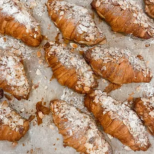 Divine almond croissants: golden layers of flakiness embracing a rich almond filling. A heavenly marriage of crunch and indulgence.